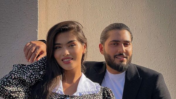 Известный азербайджанский певец Аяз Бабаев обучился с моделью Фидан Алиевой - Sputnik Азербайджан