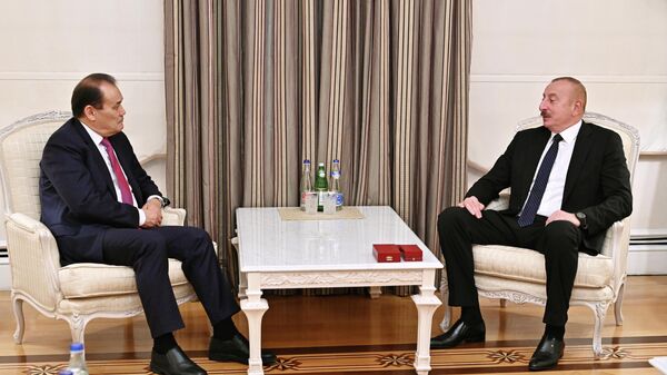 Президент Азербайджана Ильхам Алиев принял генерального секретаря Организации тюркских государств Багдада Амреева - Sputnik Азербайджан