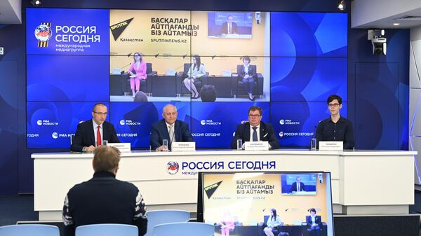 Видеомост Москва – Астана в пресс-центре медиагруппы Россия сегодня - Sputnik Азербайджан