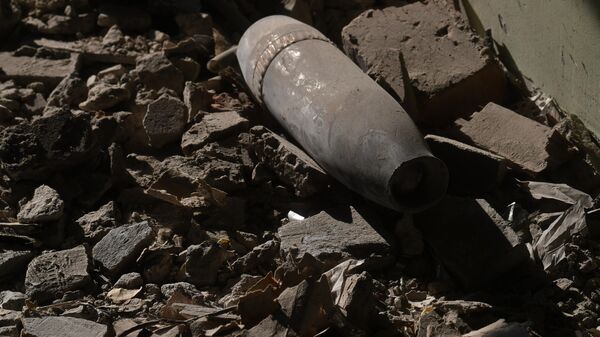 Неразорвавшийся снаряд в Артемовске - Sputnik Азербайджан