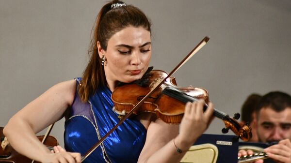 На сцене Азербайджанской государственной академической филармонии имени Муслима Магомаева прошел концерт - Sputnik Азербайджан