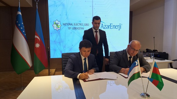 Подписан меморандум между «Национальные электрические сети Узбекистана» и «АзерЭнержи» - Sputnik Азербайджан