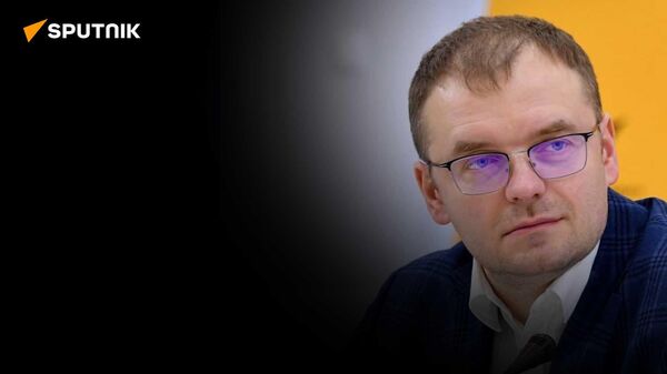 Экономист Козлов о криптовалюте ЕАЭС, новых имиджевых проектах и отказе от доллара - Sputnik Азербайджан