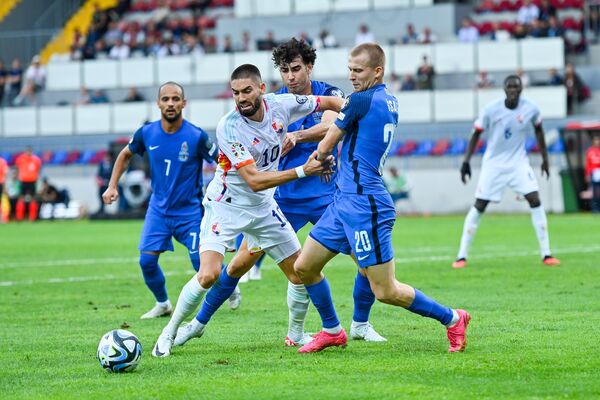 Игровой момент в матче отборочного цикла ЕВРО-2024 между сборными Азербайджана и Бельгии - Sputnik Азербайджан