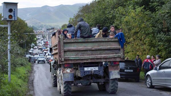 Армянские беженцы покидают Карабах - Sputnik Азербайджан