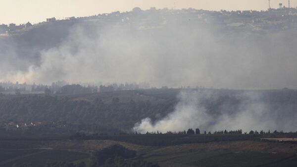 Дым после перестрелки на границе Израиля и Ливана, фото из архива - Sputnik Азербайджан