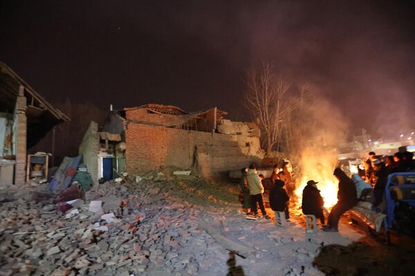 Последствие землетрясения в провинциях Ганьсу и Цинхай на северо-западе Китая. - Sputnik Азербайджан