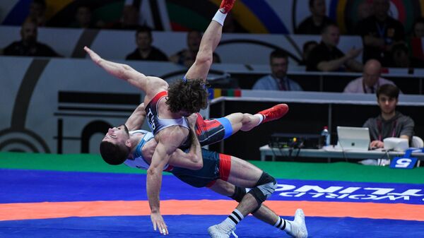 В Баку стартовал Европейский Олимпийский квалификационный турнир по борьбе - Sputnik Азербайджан