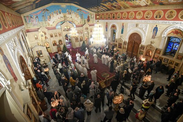 Рождественское богослужение в бакинском Кафедральном соборе святых Жен Мироносиц. - Sputnik Азербайджан