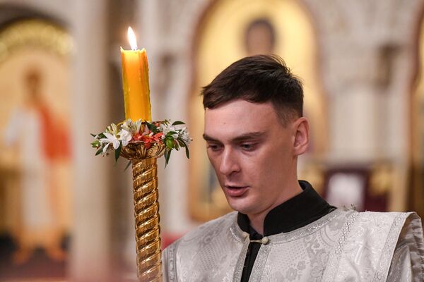 Пасхальное богослужение в Кафедральном соборе св. Жен-Мироносиц в Баку Пасхальное богослужение в Кафедральном соборе св. Жен-Мироносиц в Баку - Sputnik Азербайджан