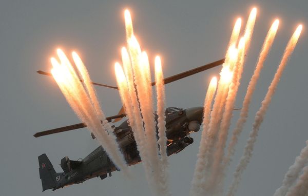 Боевой вертолет Ка-52 "Аллигатор" во время всероссийского этапа международного конкурса "Авиадартс-2016" на испытательном полигоне Воздушно-космических сил РФ "Чауда" под Феодосией - Sputnik Азербайджан
