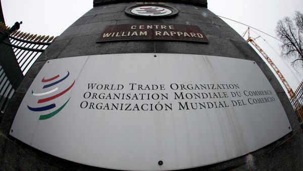 World Trade Organization (WTO) logo at the entrance of the WTO headquarters in Geneva - Sputnik Азербайджан
