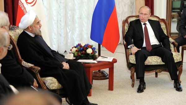 Президент России Владимир Путин (справа) и президент Исламской Республики Иран Хасан Роухани - Sputnik Азербайджан