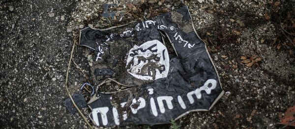 The flag of the radical Islamist organization Islamic State of Iraq - Sputnik Азербайджан