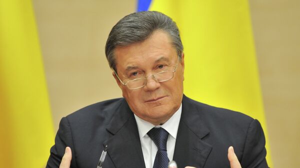 Отстраненный от должности президента Украины Виктор Янукович - Sputnik Azərbaycan