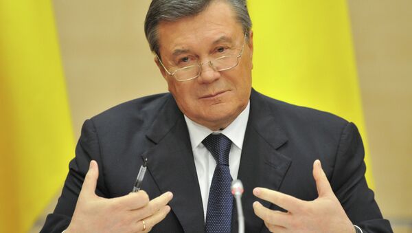 Отстраненный от должности президента Украины Виктор Янукович - Sputnik Azərbaycan
