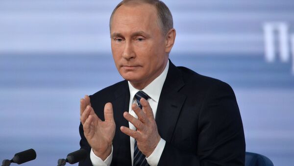 Президент России Владимир Путин. Архивное фото - Sputnik Азербайджан