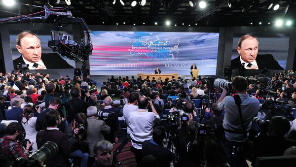 December 17, 2015. Russian President Vladimir Putin at the 11th annual news conference at the World Trade Center on Krasnaya Presnya - Sputnik Azərbaycan