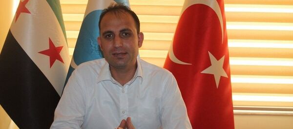 Заместитель председателя партии Национальное движение сирийских туркмен  Тарык Суло Джевизджи - Sputnik Азербайджан