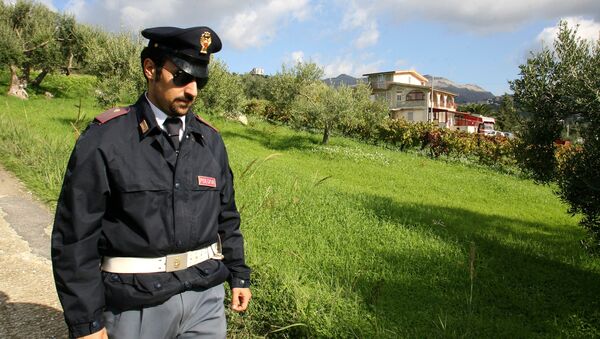 Полицейский в Сицилии. Архивное фото - Sputnik Азербайджан