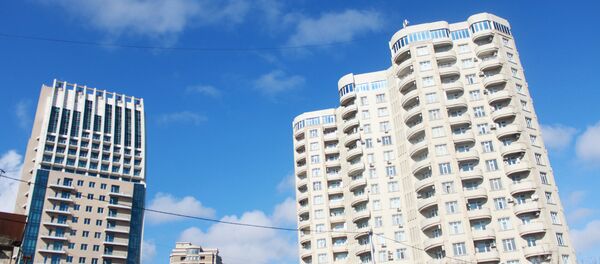 Многоэтажные жилые дома в Баку Многоэтажные жилые дома в Баку - Sputnik Азербайджан