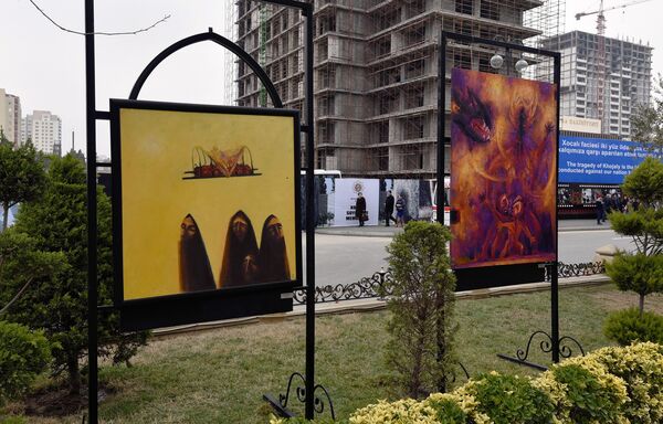 Выставка рисунков, посвященная 24-й годовщине Ходжалинской трагедии - Sputnik Азербайджан
