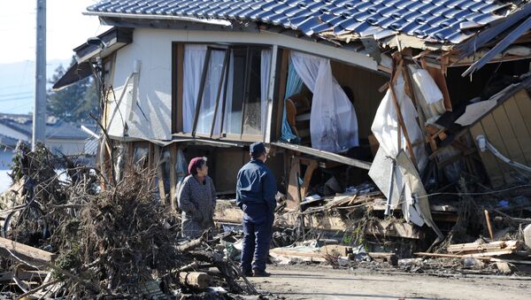 Катастрофическое землетрясения в Японии магнитудой 9.0 произошло 11 марта 2011 года - Sputnik Азербайджан