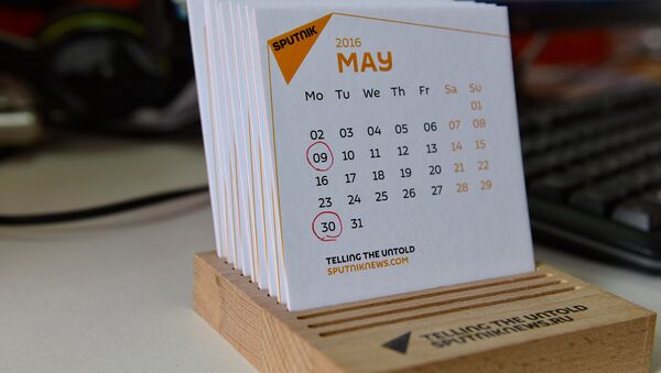Нерабочие дни в мае отмечены на календаре - Sputnik Азербайджан