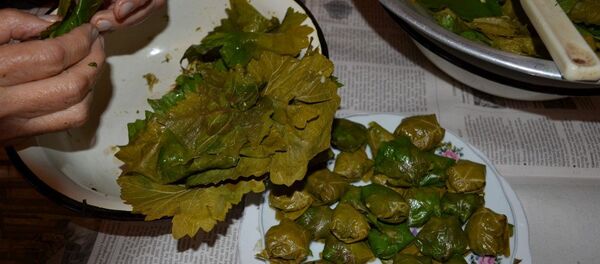 В качестве начинки долмы используется мясной фарш В качестве начинки долмы используется мясной фарш - Sputnik Азербайджан