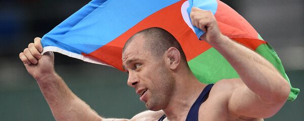 Золотой призер Европейских игр по борьбе Хетаг Газюмов Золотой призер Европейских игр по борьбе Хетаг Газюмов - Sputnik Азербайджан