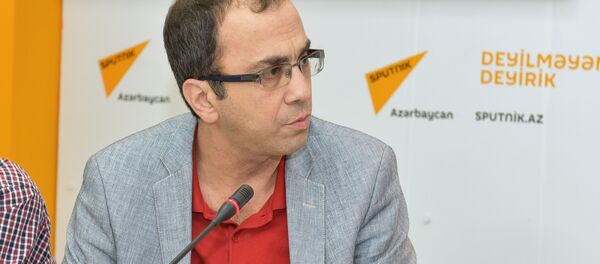 Генеральный директор Центра исследования наследия Гейдара Алиева Фуад Бабаев - Sputnik Азербайджан