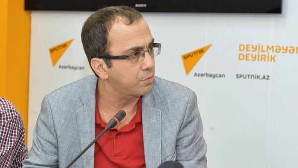 Генеральный директор Центра исследования наследия Гейдара Алиева Фуад Бабаев - Sputnik Азербайджан