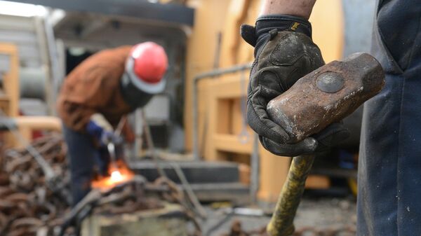 Рабочие на стройке. Архивное фото - Sputnik Азербайджан