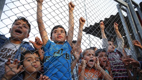Türkiyənin Qaziantep vilayətinin Nizip düşərgəsindəki Suriyalı qaçqın uşaqlar. Arxiv şəkli - Sputnik Azərbaycan