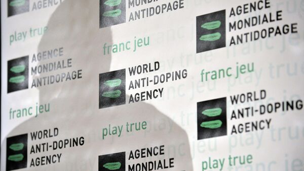 Логотип Всемирного антидопингового агентства на стене. Архивное фото - Sputnik Азербайджан