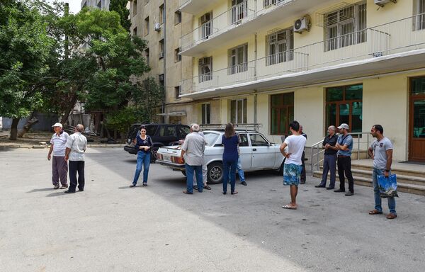 Начался снос здания, расположенного по улице Шарифзаде, 33 в Ясамальском районе - Sputnik Азербайджан