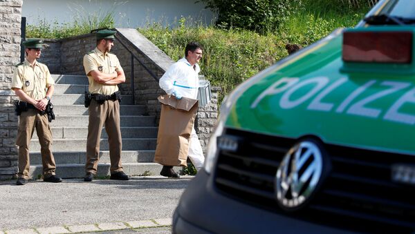 Полицейские на месте взрыва в Ансбахе. Германия, 25 июля 2016 года - Sputnik Азербайджан
