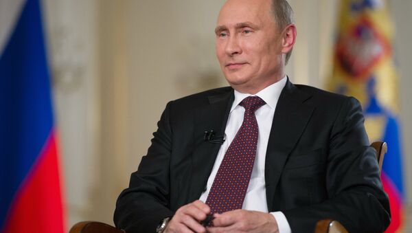 Президент РФ Владимир Путин. Архивное фото - Sputnik Азербайджан