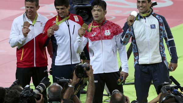 Рустам Оруджев (первый справа) – серебряный призер Олимпиады в Рио-де-Жанейро - Sputnik Азербайджан