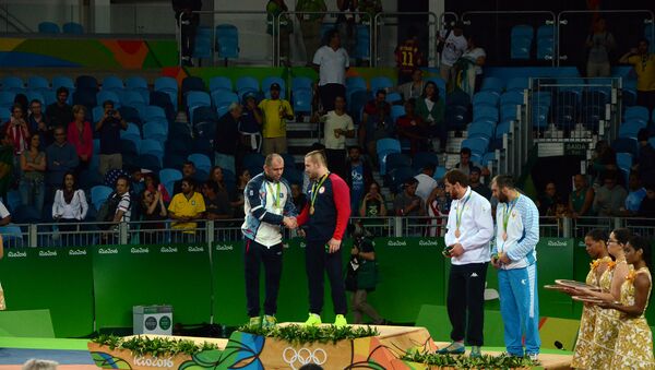 Медалисты Олимпиады в соревнованиях по вольной борьбе среди мужчин в весовой категории до 97 кг - Sputnik Азербайджан