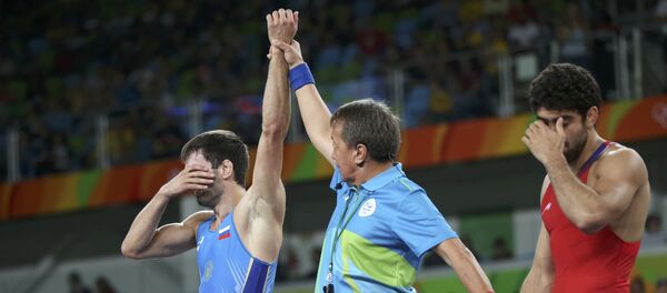 Вольная борьба, до 65 кг, мужчины. Финал. Поединок Тогрул Аскеров - Сослан Рамонов (Россия) Вольная борьба, до 65 кг, мужчины. Финал. Поединок Тогрул Аскеров - Сослан Рамонов (Россия) - Sputnik Азербайджан
