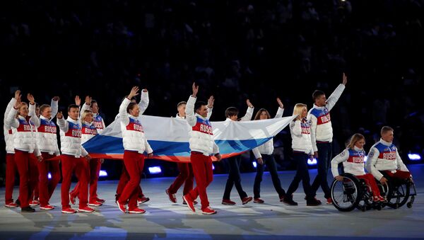 Представители России перед началом церемонии закрытия XI зимних Паралимпийских игр в Сочи. - Sputnik Азербайджан