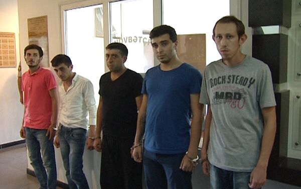 Члены преступной группировки, обвиняемые в убийстве Эльнура Гумбатова - Sputnik Азербайджан