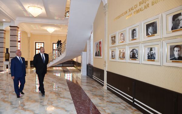 Ильхам Алиев в рамках поездки в Хачмазский район принял участие в открытии нового здания Центра Гейдара Алиева - Sputnik Азербайджан