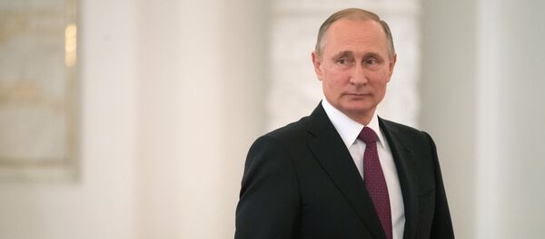 Президент РФ Владимир Путин во время встречи в Кремле с паралимпийской сборной России по летним видам спорта Президент РФ Владимир Путин во время встречи в Кремле с паралимпийской сборной России по летним видам спорта - Sputnik Азербайджан