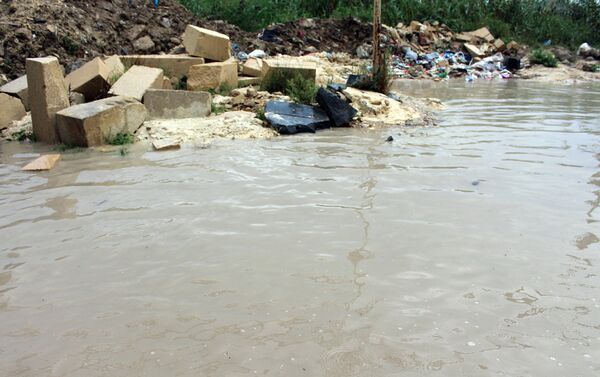 Затопленные улицы поселка Забрат - Sputnik Азербайджан