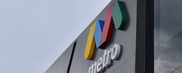 Эмблема Бакинского метрополитена на стене станции Мемар Аджеми-2 Эмблема Бакинского метрополитена на стене станции Мемар Аджеми-2 - Sputnik Азербайджан