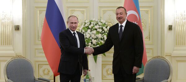 Президент России Владимир Путин и президент Азербайджана Ильхам Алиев, архивное фото - Sputnik Азербайджан