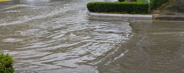 Последствия дождя в Баку, фото из архива Последствия дождя в Баку, фото из архива - Sputnik Азербайджан