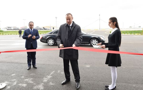 Ильхам Алиев принял участие в открытии Музыкального центра в городе Агстафа - Sputnik Азербайджан